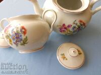 Old Porcelain teapot and sugar bowl for tea