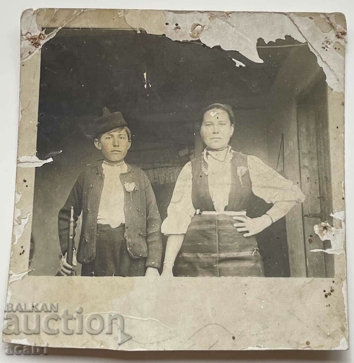 A boy with a rifle and his mother with price 14.99 BGN | € 7.66 A boy with a rifle and his mother with price 14.99 BGN | € 7.66