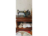Retro hand sewing machine LADA about 100 years old.