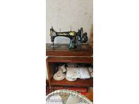 Retro hand sewing machine LADA about 100 years old.