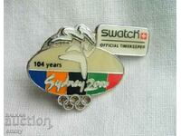 Insigna Jocurilor Olimpice de la Sydney 2000 - Sponsor Swatch