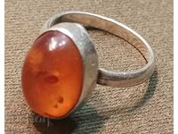 Beautiful and valuable women's silver ring with amber.
