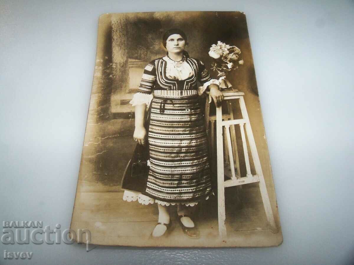 Auction Old photo postcard of a woman in a costume Auction Old photo postcard of a woman in a costume