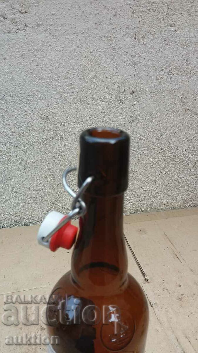 BOTTLE WITH AN INTERESTING CAP - 7