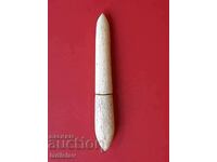 Ancient object made of walrus tooth