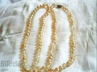 old delgo necklace of natural glass pearls