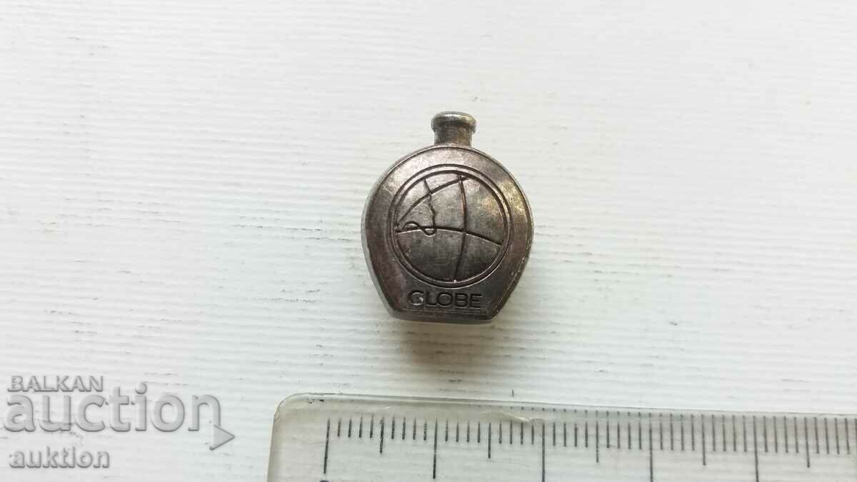 SILVER PLATED GLOBE BADGE