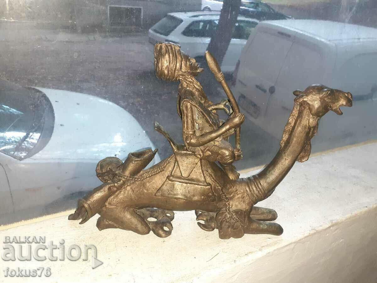 Auction Old bronze statuette of a warrior with a camel figure plastic Auction Old bronze statuette of a warrior with a camel figure plastic