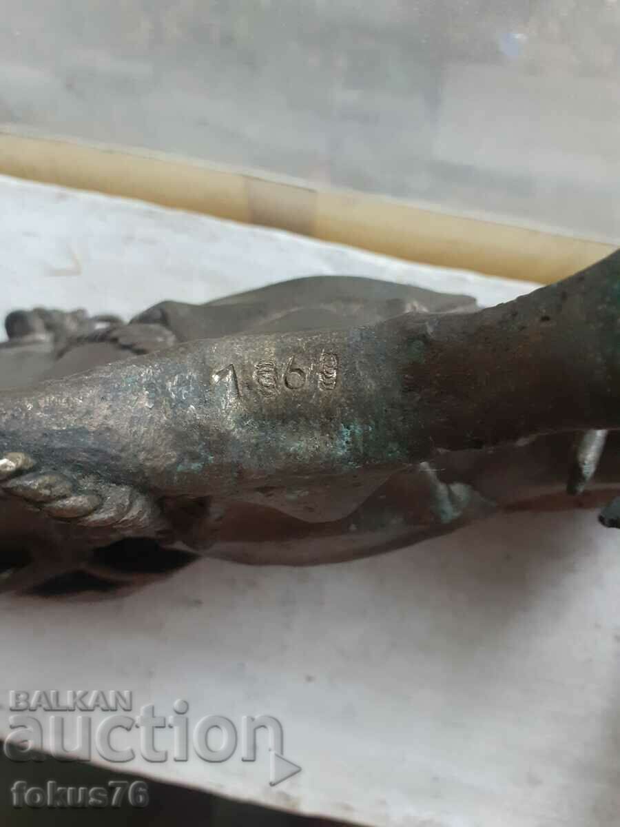 Delivery of Old bronze statuette of a warrior with a camel figure plastic Delivery of Old bronze statuette of a warrior with a camel figure plastic