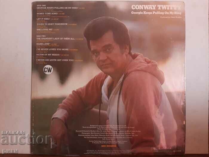Conway Twitty – Georgia Keeps Pulling On My Ring 1978 with price 33.00 BGN | € 16.87 Conway Twitty – Georgia Keeps Pulling On My Ring 1978 with price 33.00 BGN | € 16.87