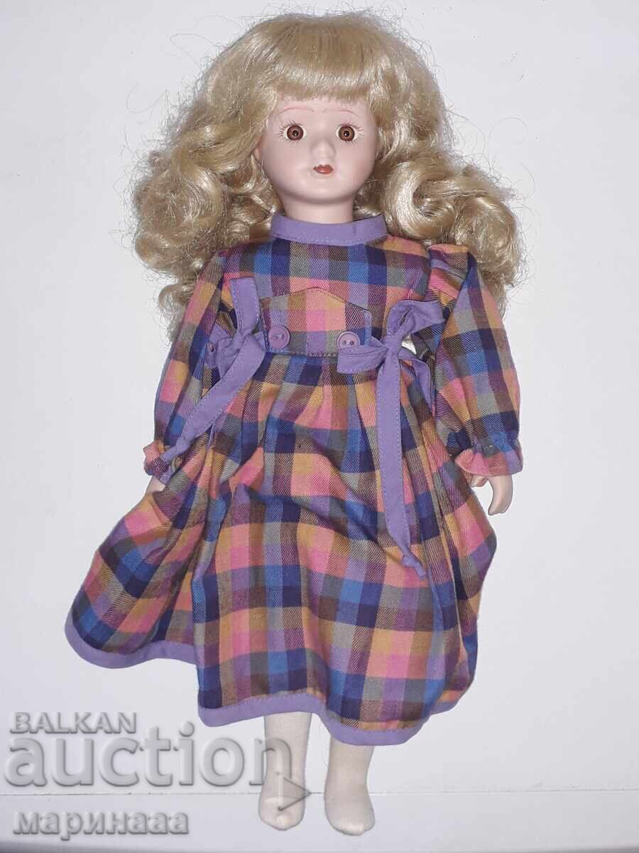 OLD DOLL. PORCELAIN. GERMANY