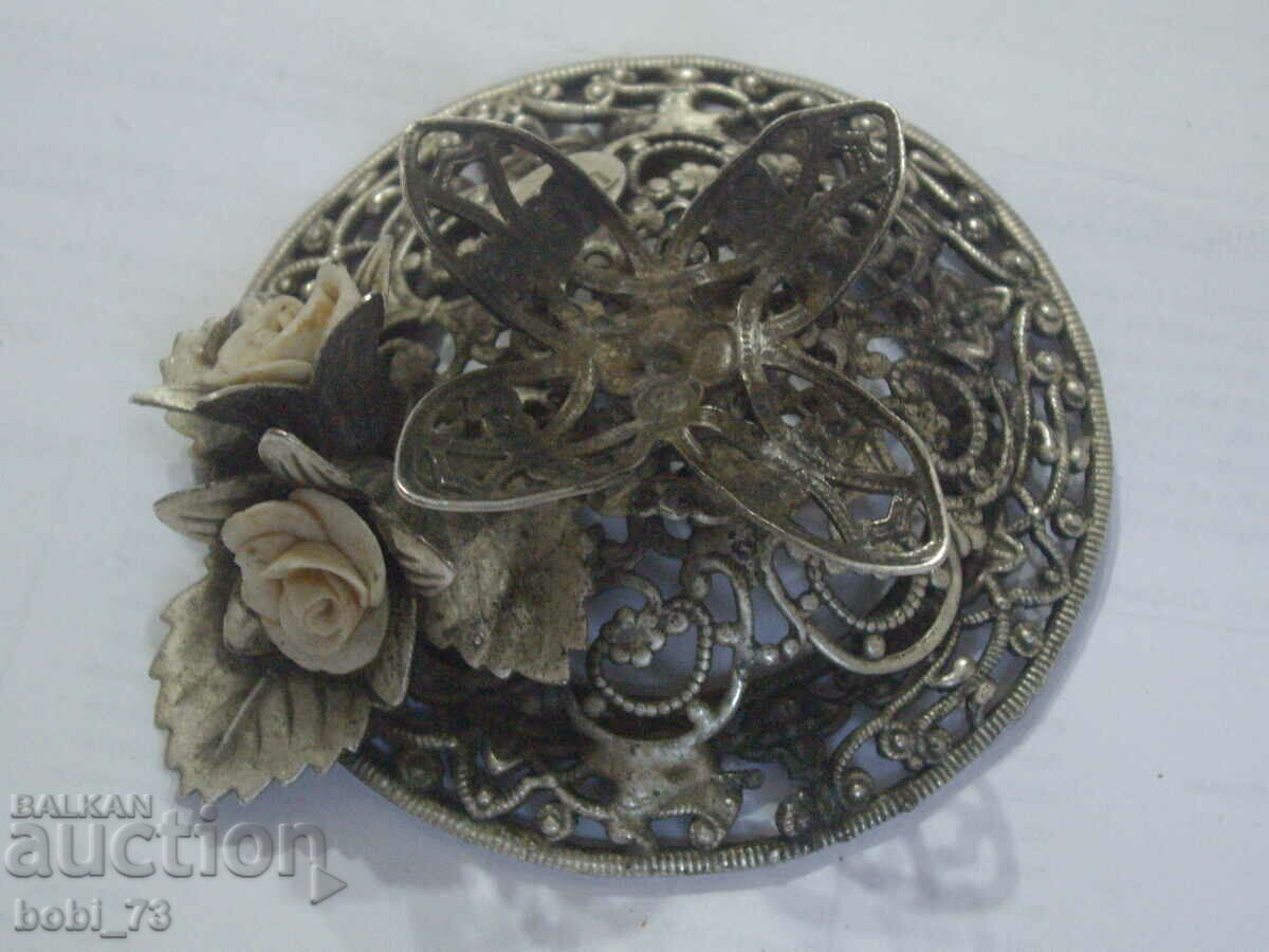 Beautiful old silver filigree ornament.