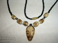 OLD NECKLACE. BONE, BEADS, BRONZE