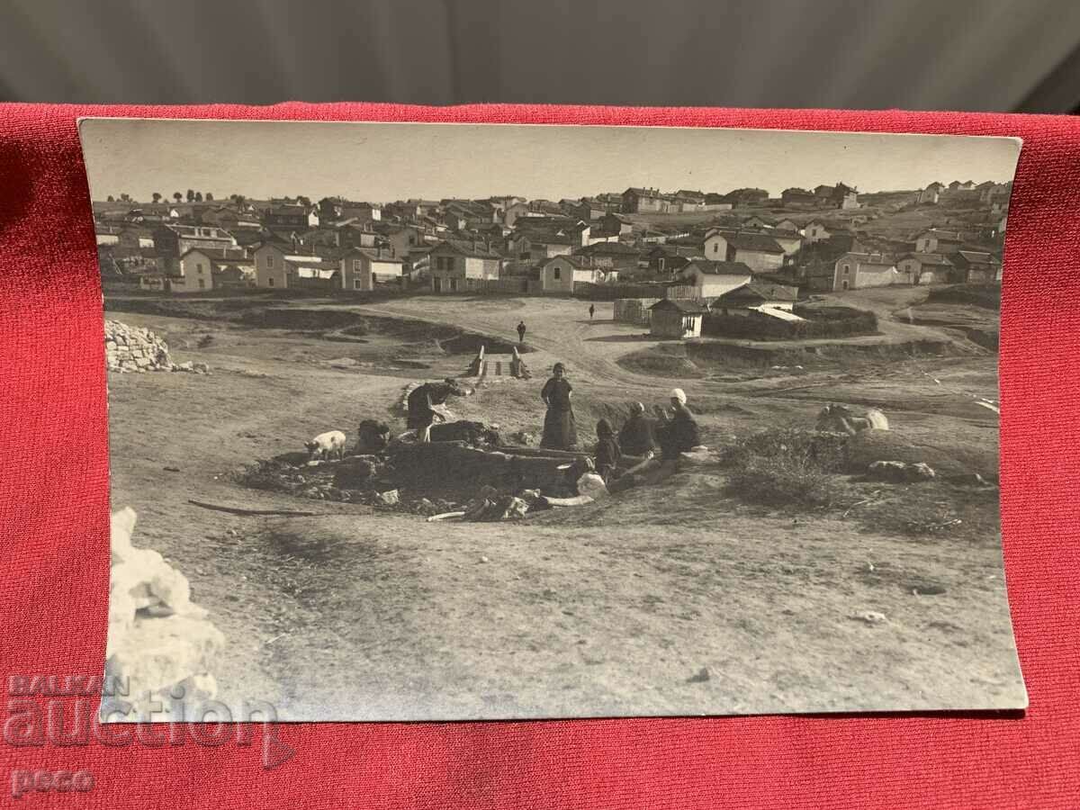 Auction At the tap Washing clothes Beat and culture old photo Auction At the tap Washing clothes Beat and culture old photo