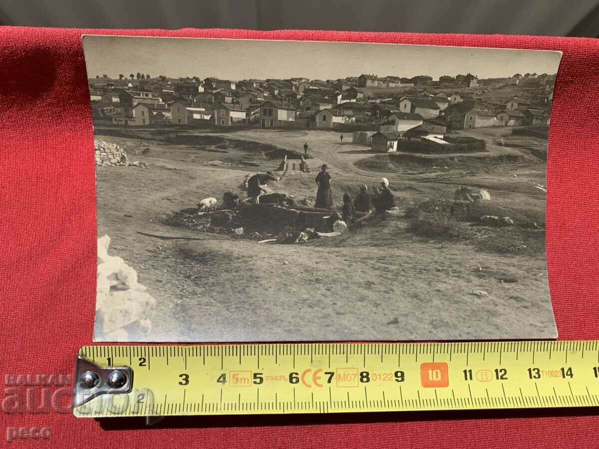 Delivery of At the tap Washing clothes Beat and culture old photo Delivery of At the tap Washing clothes Beat and culture old photo