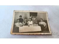 Photo Six young men having a drink with a vintage gramophone 1941