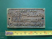 Antique bronze advertising plaque