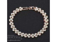 New, women's bracelet with white crystals in the shape of hearts