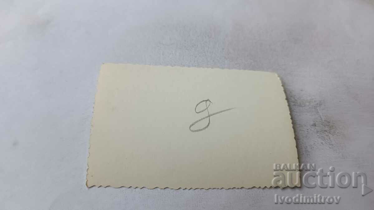 Photo A man and three women on a stone on the seashore with price 1.65 BGN | € 0.84 Photo A man and three women on a stone on the seashore with price 1.65 BGN | € 0.84