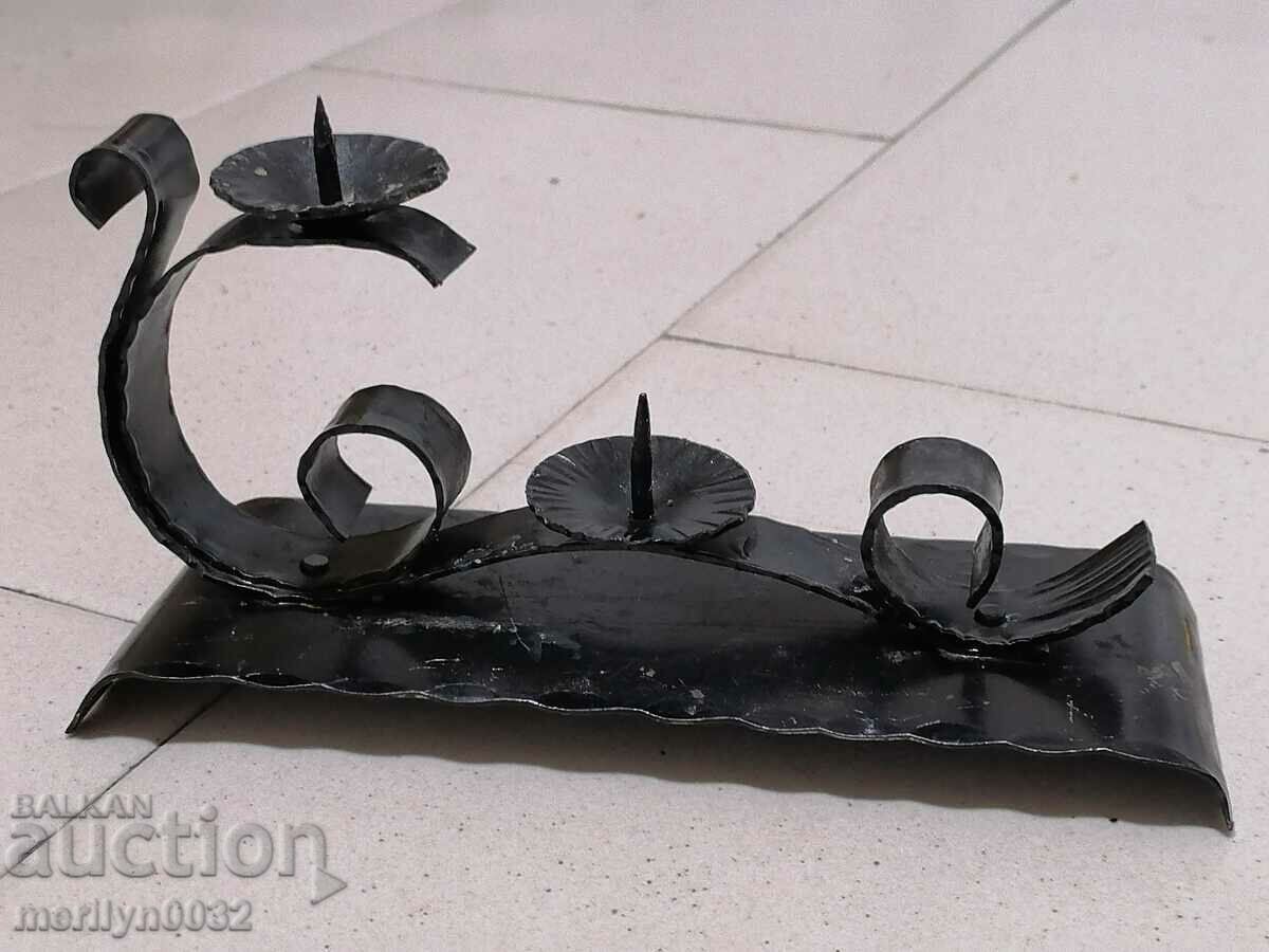 An old forged candlestick from a period period candle with price 39.00 BGN | € 19.94 An old forged candlestick from a period period candle with price 39.00 BGN | € 19.94