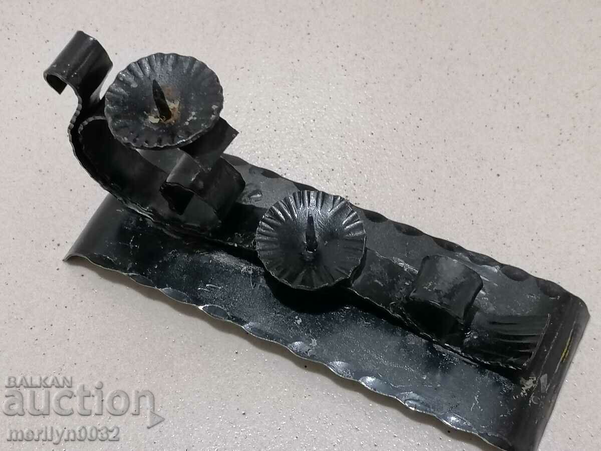 Auction An old forged candlestick from a period period candle Auction An old forged candlestick from a period period candle