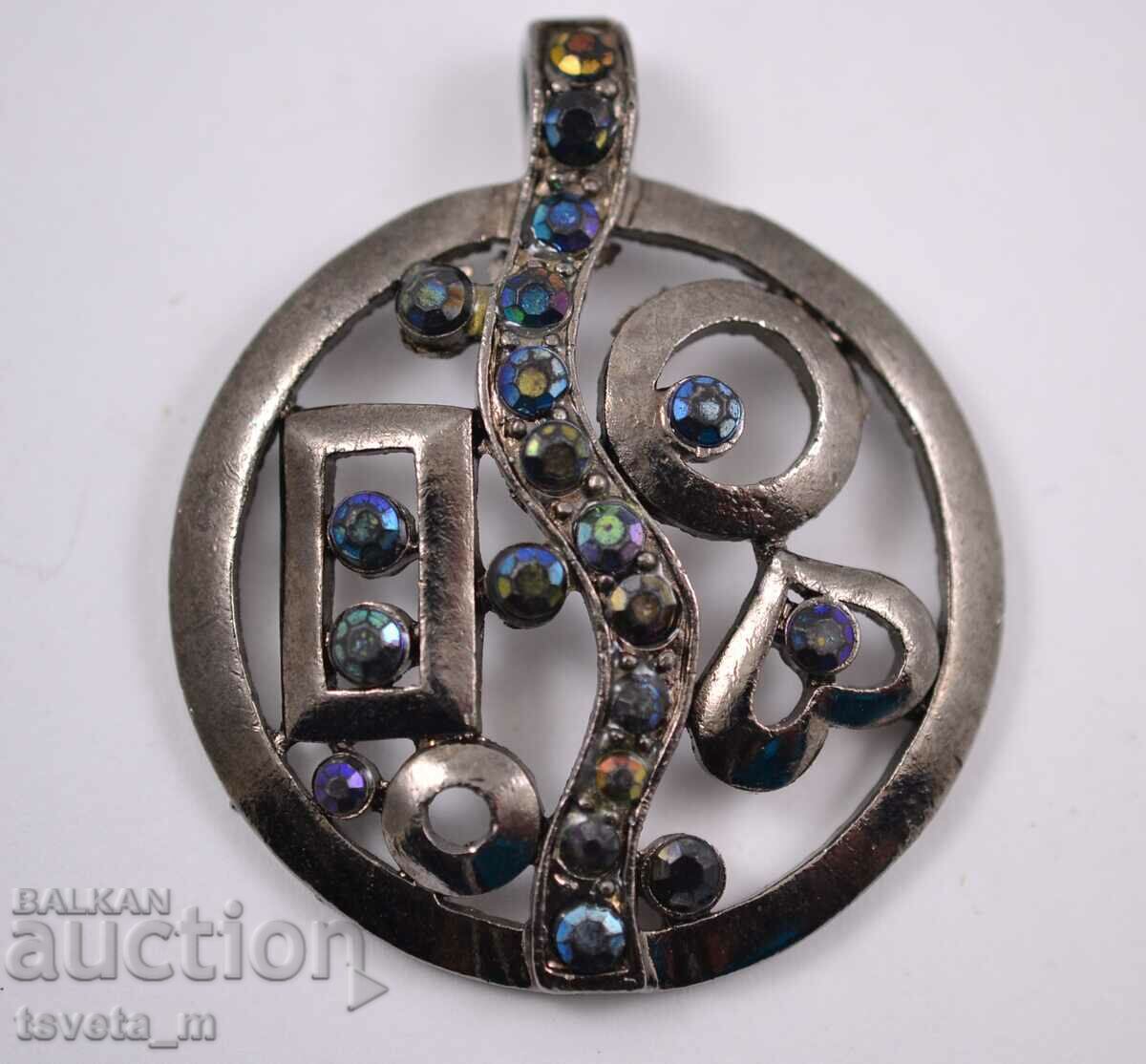 Δημοπρασία Μετάλλιο, μενταγιόν