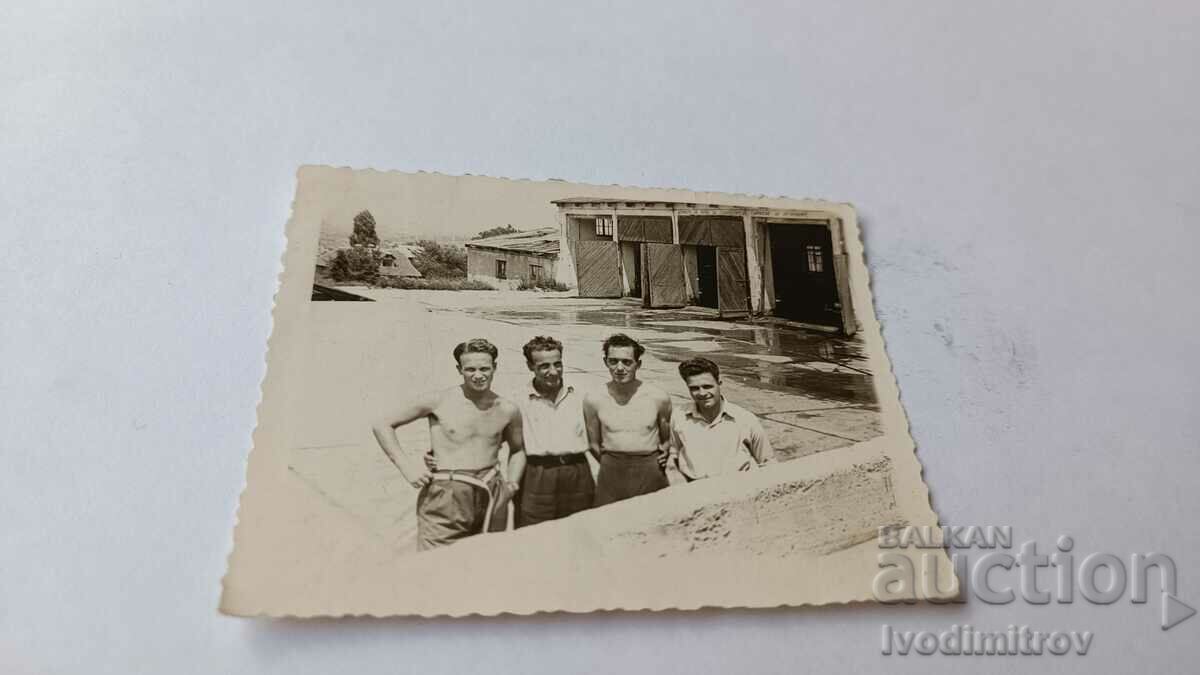 Photo Four young men