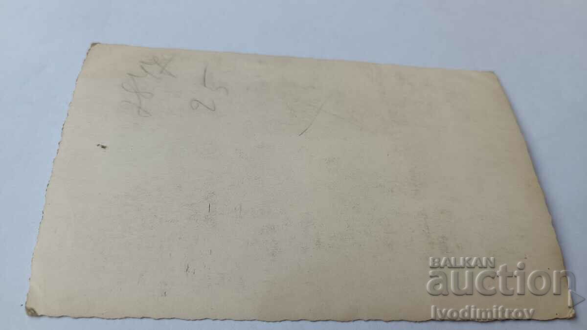 Photo Sofia Men and women on the sidewalk with price 2.35 BGN | € 1.20