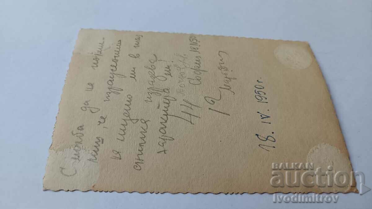 Photo Sofia Woman walking along 1950 Tsar Osvoboditel Blvd with price 1.85 BGN | € 0.95 Photo Sofia Woman walking along 1950 Tsar Osvoboditel Blvd with price 1.85 BGN | € 0.95