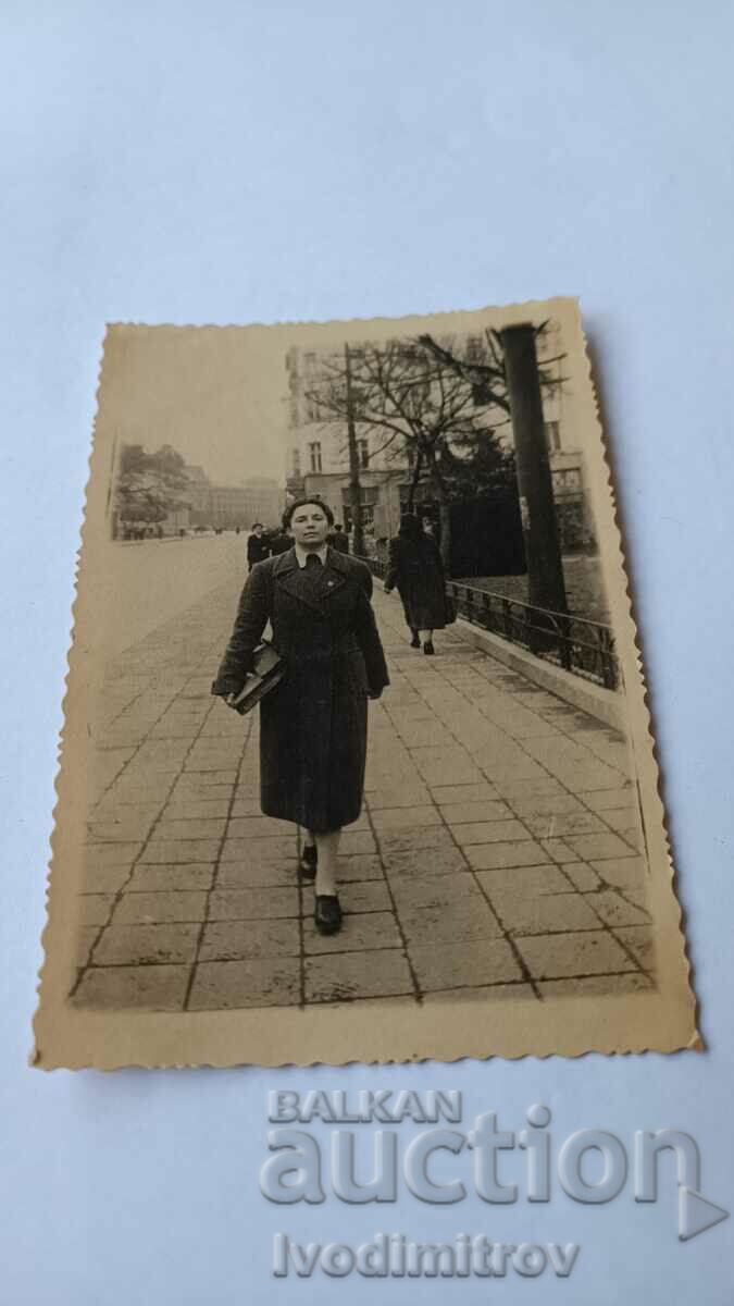 Photo Sofia Woman walking along 1950 Tsar Osvoboditel Blvd