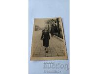 Photo Sofia Woman walking along 1950 Tsar Osvoboditel Blvd