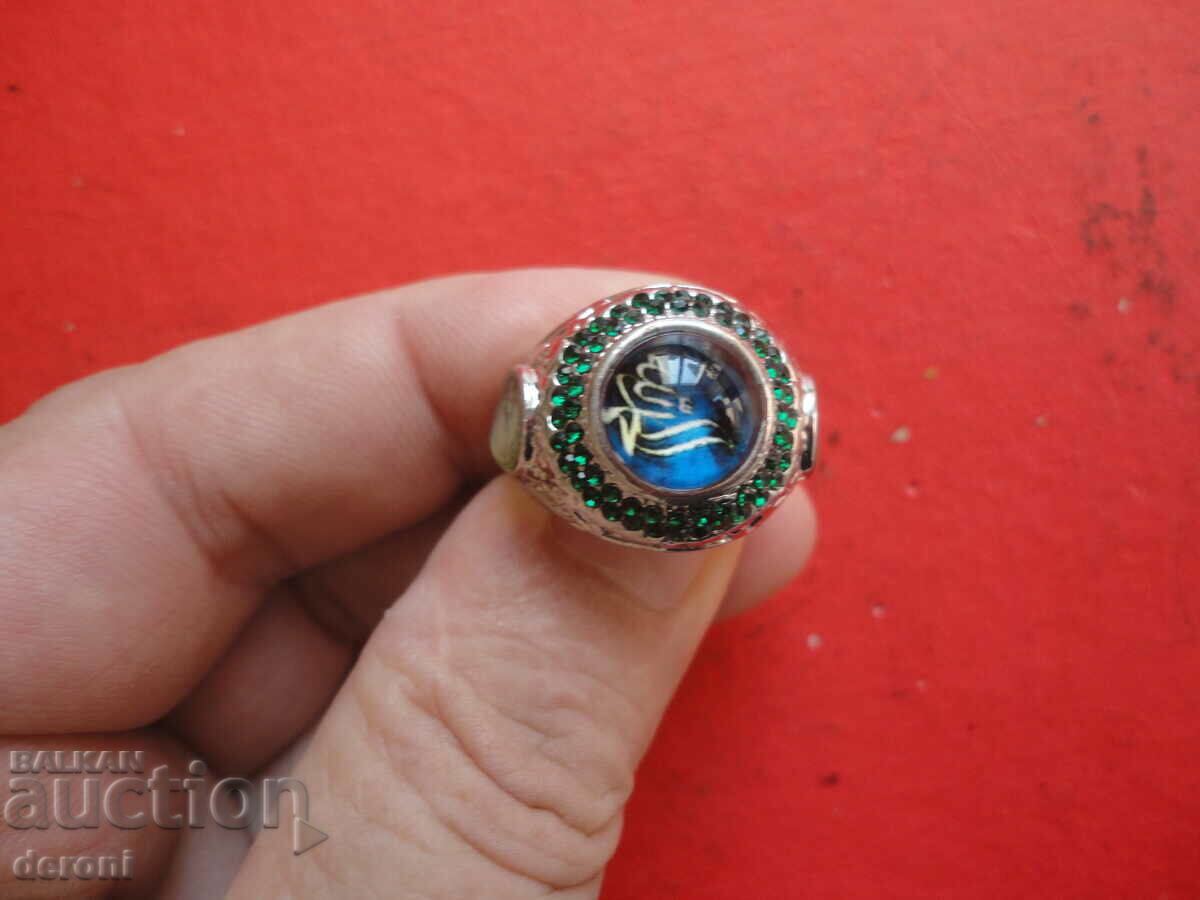 Auction  A great ring with enamel stones
