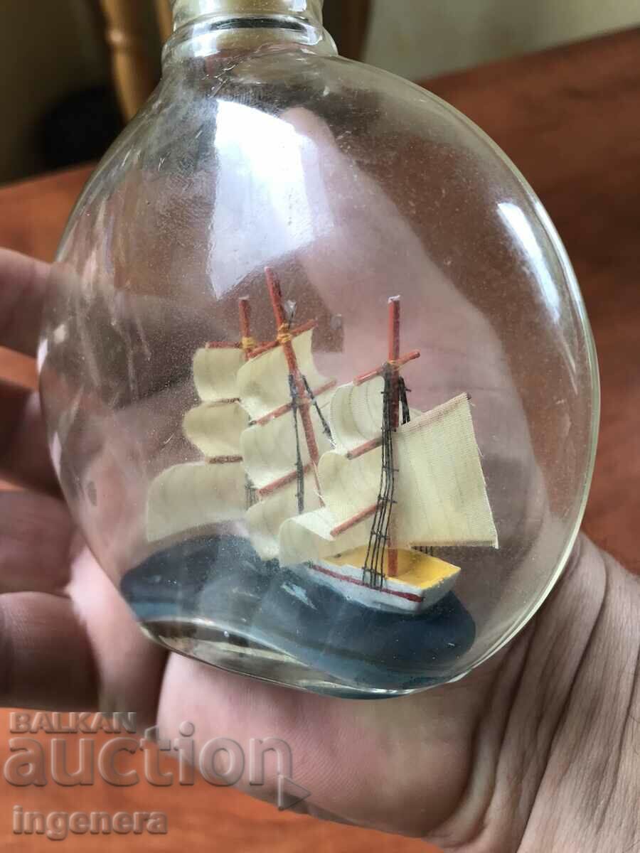 Auction BOTTLE BOTTLE WITH A SHIP MOUNTED IN IT Auction BOTTLE BOTTLE WITH A SHIP MOUNTED IN IT