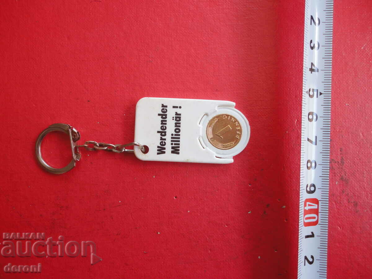 Great key ring with gold plated coin with price 10.00 BGN | € 5.11 Great key ring with gold plated coin with price 10.00 BGN | € 5.11