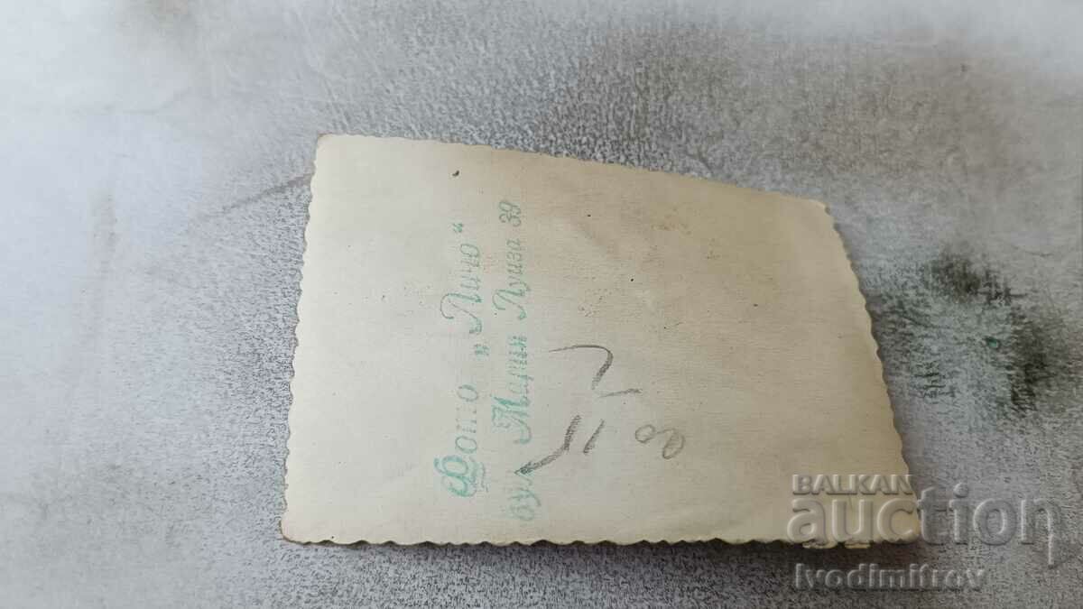 Photo Sofia A woman with a winter coat on the sidewalk with price 2.45 BGN | € 1.25