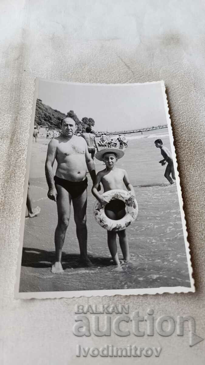 Photo Burgas Man and boy on the beach 1970