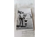 Photo Burgas Man and boy on the beach 1970