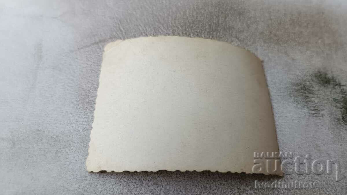 Photo Man and two little boys on the beach with price 1.65 BGN | € 0.84