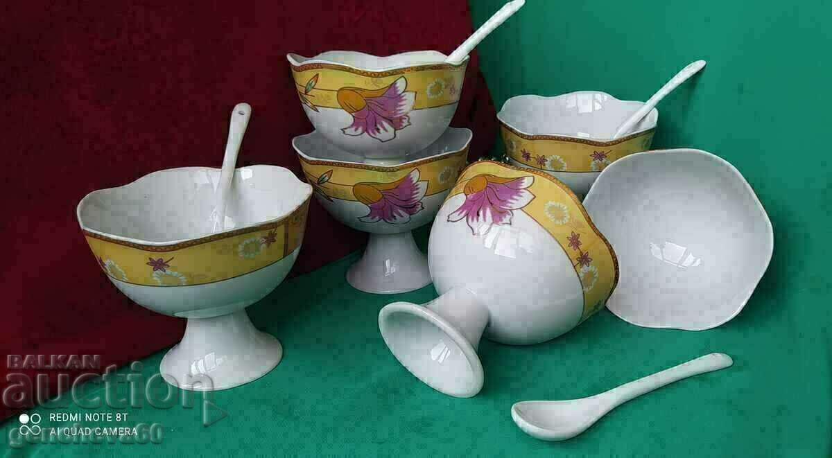 Set of porcelain ice cream cups with spoons