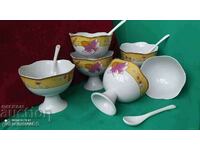 A beautiful set of porcelain melba cups/spoons