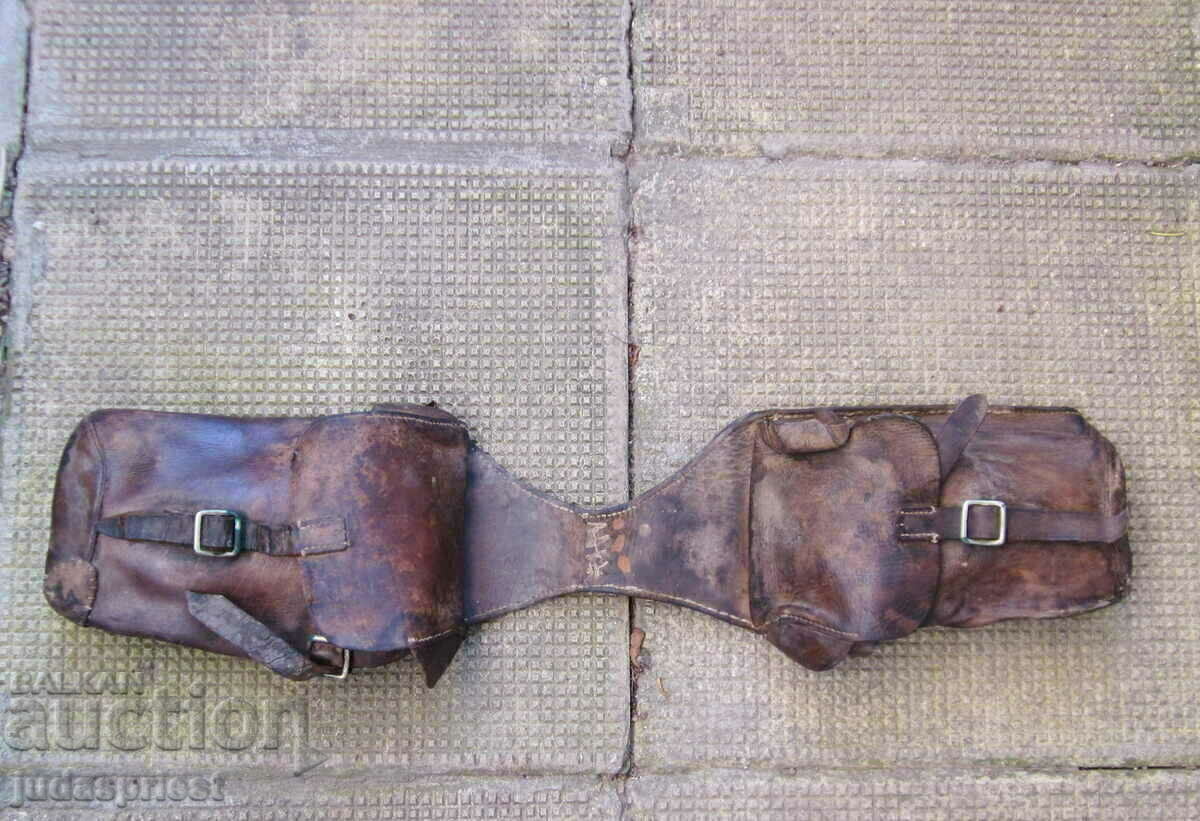 Delivery of Old leather saddlebags and a leather pouch for a military motorcycle Delivery of Old leather saddlebags and a leather pouch for a military motorcycle