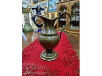 A wonderful antique teapot old solid bronze