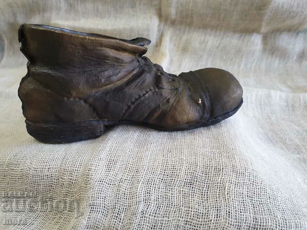 Delivery of Vintage beautiful plastic of an old shoe Delivery of Vintage beautiful plastic of an old shoe