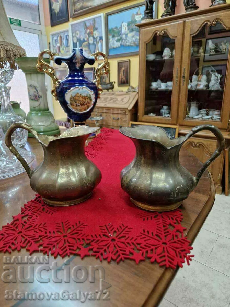 A pair of great antique jugs solid solid bronze