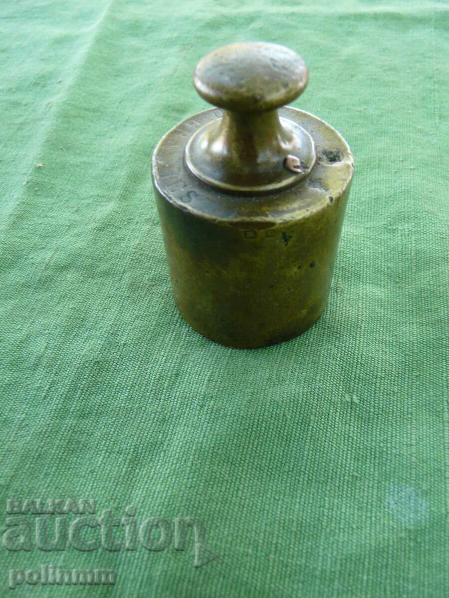 Old bronze scale weight
