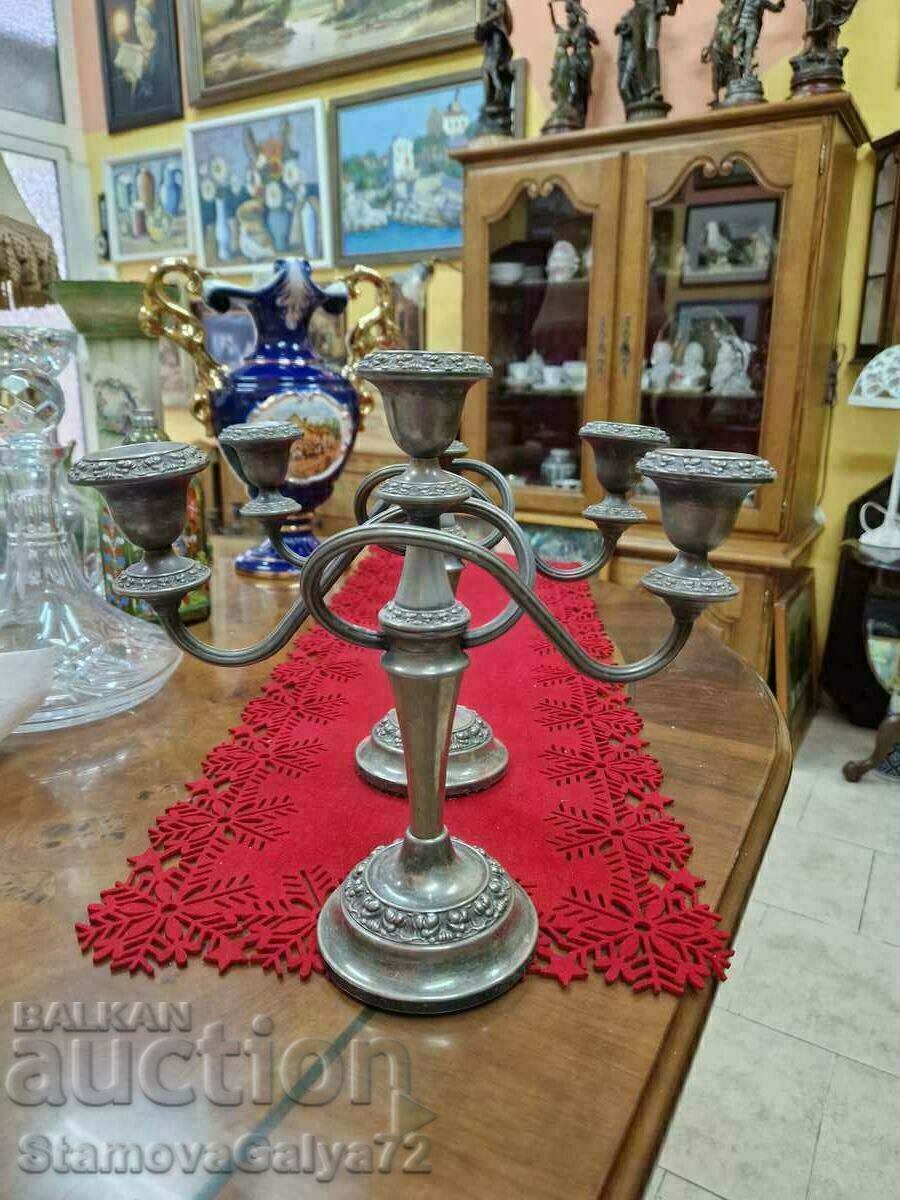 Delivery of A pair of great antique silver plated candlesticks Delivery of A pair of great antique silver plated candlesticks