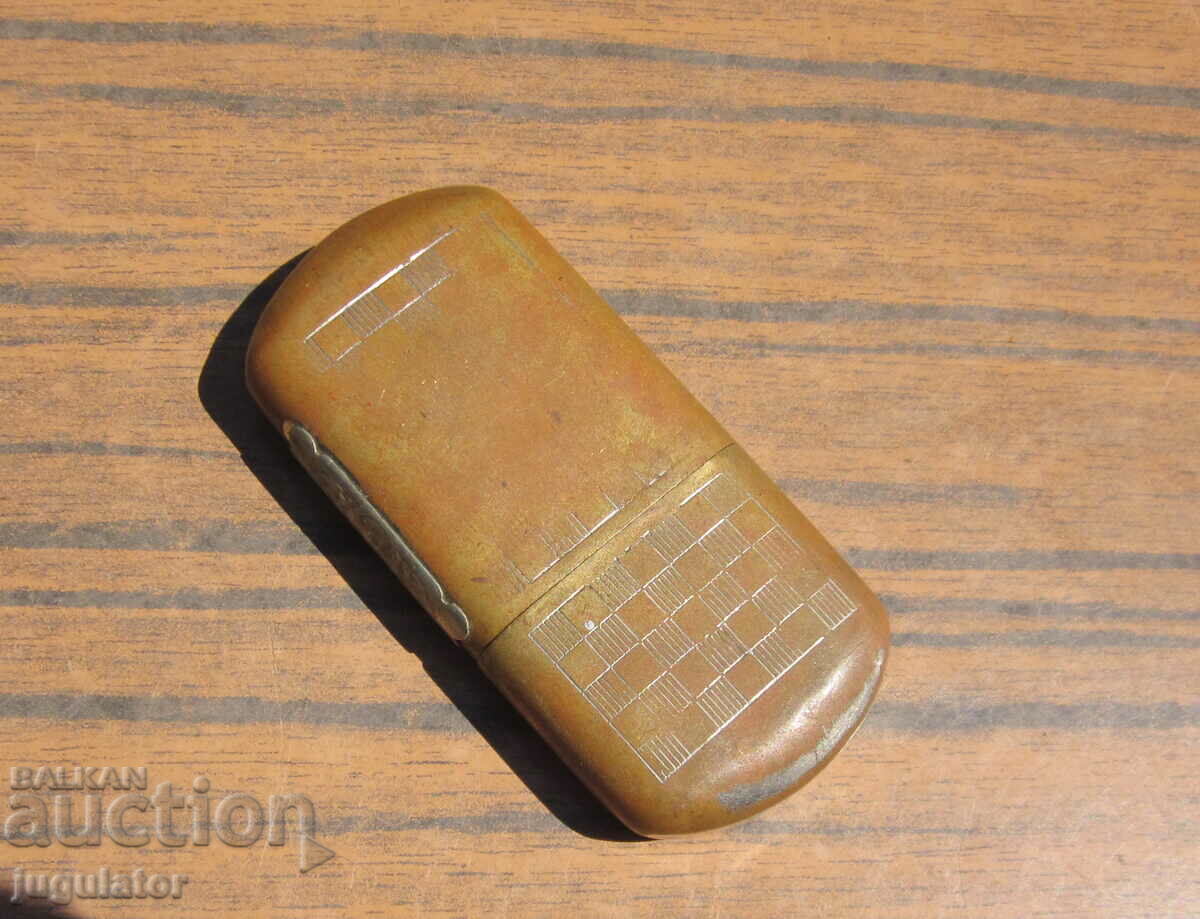 antique bronze working petrol lighter from the 1930s