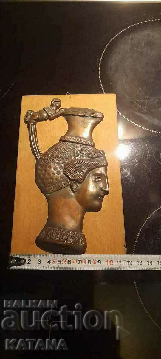 Αναμνηστικό από χαλκό και ξύλινο τοίχο γυναικείας κεφαλής ρυτό με τιμή € 25.50 | 49.87 BGN