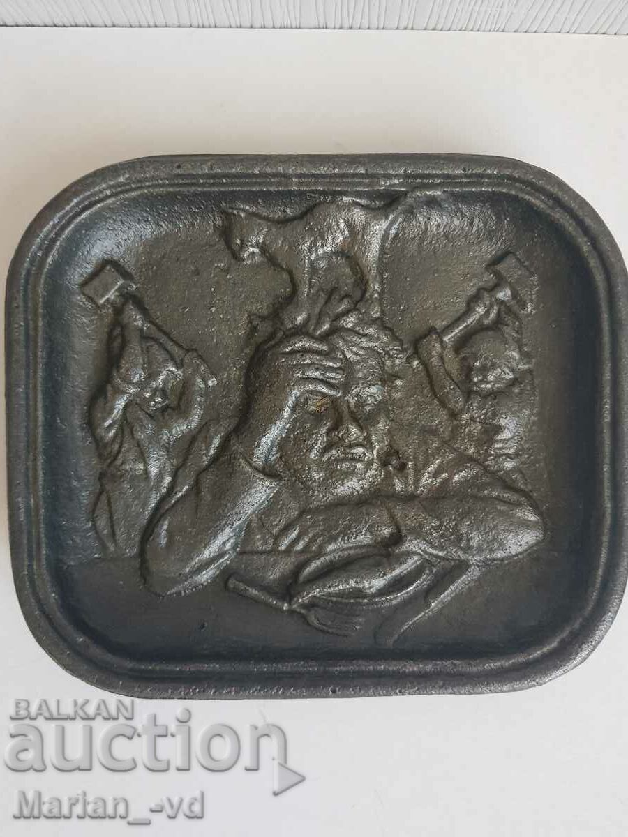 Cast iron plate with scene