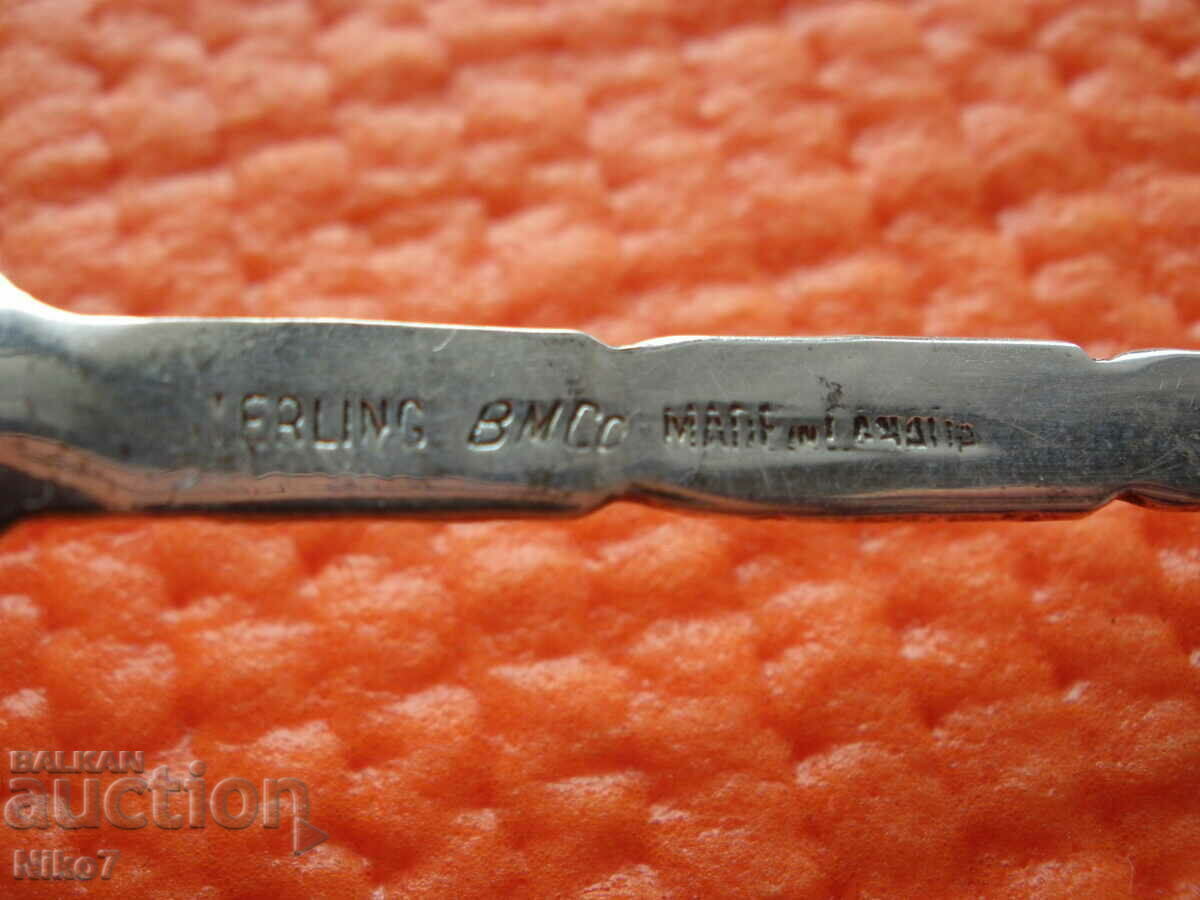 Auction  Old silver spoon - Canada.